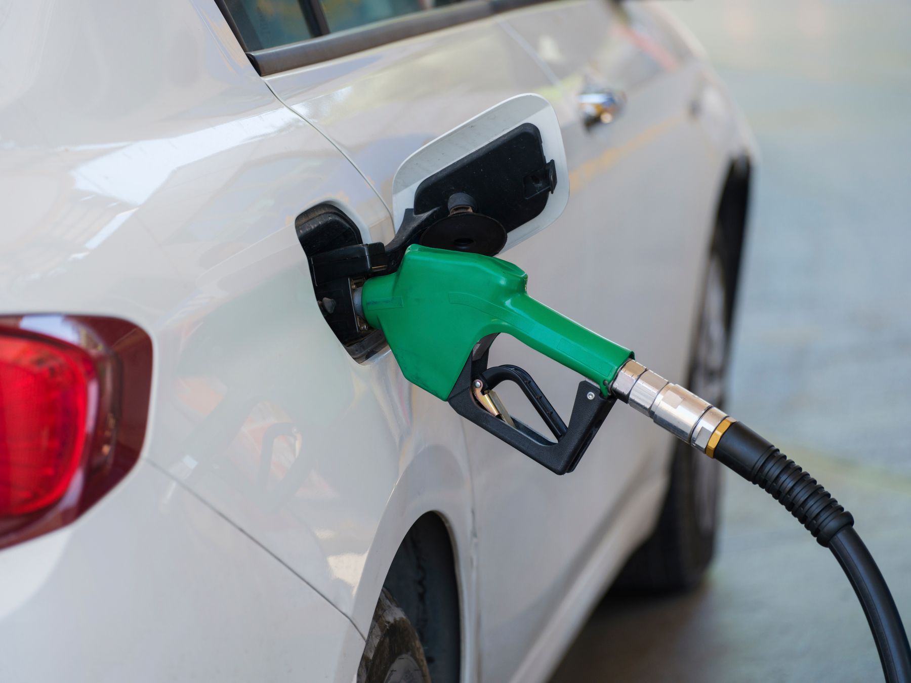 Cars beside a Southern California gas station showing high fuel prices